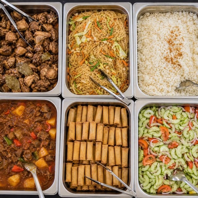 Prepared catering trays ready for corporate delivery and setup